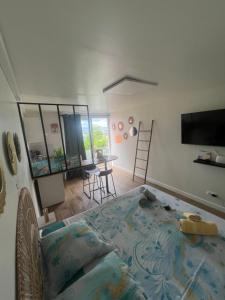 Krevet ili kreveti u jedinici u okviru objekta Laroom Kanel - Vue Mer & Piscine