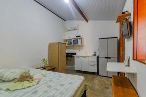 Kuchyň nebo kuchyňský kout v ubytování Pousada O Rancho Alegre