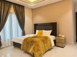 Postel nebo postele na pokoji v ubytování Nimbus Nook Apartments, GRA Ikeja, Lagos + 37 fotografií