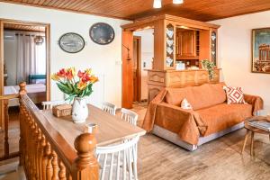 a living room with a couch and a table at Nisaki House in Skiathos