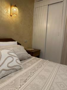 Postel nebo postele na pokoji v ubytování Villa Pietra