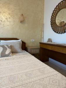 Postel nebo postele na pokoji v ubytování Villa Pietra