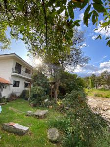Zahrada ubytování Apartamentos Otorongo Cuenca Ecuador