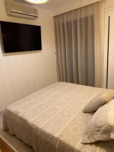 Postel nebo postele na pokoji v ubytování Villa Pietra