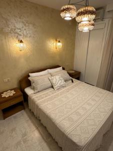 Postel nebo postele na pokoji v ubytování Villa Pietra