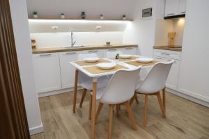 Kuchyň nebo kuchyňský kout v ubytování Central Apartment Berat + 37 fotografií
