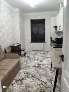 Kuchyň nebo kuchyňský kout v ubytování ЖК Guncha apartments