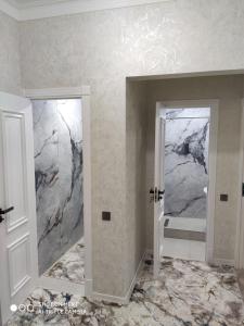 Koupelna v ubytování ЖК Guncha apartments