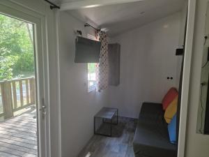 TV a/nebo společenská místnost v ubytování Camping l'Or Bleu + 5 fotografií