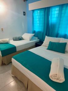 Hotel mantarraya 객실 침대