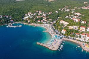 an aerial view of a beach and the ocean at Apartments Kala in Jadranovo +52 photos