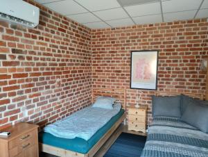 Posteľ alebo postele v izbe v ubytovaní Apartament „Sowa” jezioro 250m, góry