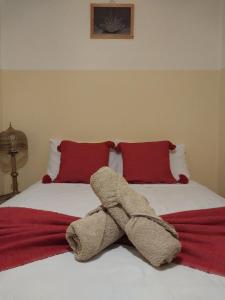 Postel nebo postele na pokoji v ubytování Riad Flottement Des Songes