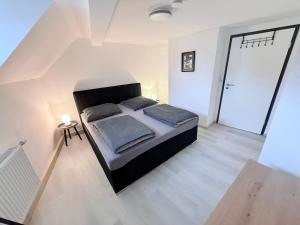 Postel nebo postele na pokoji v ubytování nextApart 03 - Coburg City