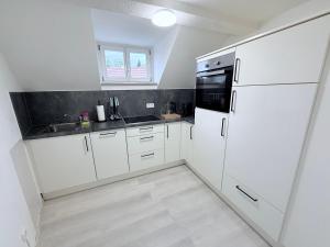 Kuchyň nebo kuchyňský kout v ubytování nextApart 03 - Coburg City