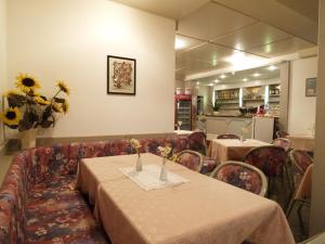 Restoran või mõni muu söögikoht majutusasutuses Hotel Miorelli