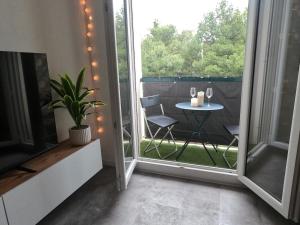 Balkoni atau teres di T2 Cosy romantic, balcon,clim, parking gratuit +4 gambar