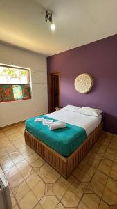 Postel nebo postele na pokoji v ubytování santo hostel parati + 6 fotografií