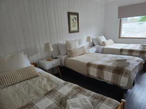 Postel nebo postele na pokoji v ubytování Santa Rosa Hotel boutique