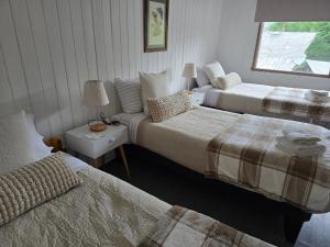 Postel nebo postele na pokoji v ubytování Santa Rosa Hotel boutique