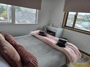 Postel nebo postele na pokoji v ubytování Santa Rosa Hotel boutique
