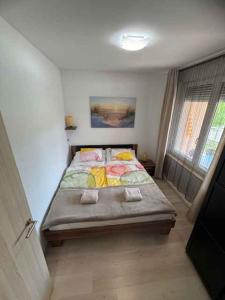 Ένα ή περισσότερα κρεβάτια σε δωμάτιο στο Apartment in Siofok - Balaton 54365