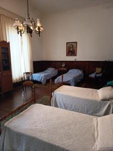 Postel nebo postele na pokoji v ubytování Casa Rosa 8