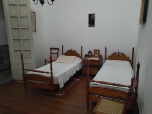 Postel nebo postele na pokoji v ubytování Casa Rosa 8