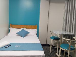 Postel nebo postele na pokoji v ubytování Hospedaje Kava