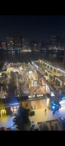 an aerial view of a city at night at شقه فندقيه in Cairo