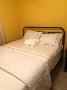 Postel nebo postele na pokoji v ubytování Jimmys Cozy Corner