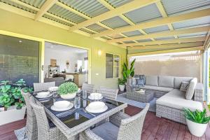 Et opholdsområde på Kabinga Kottage - Echuca Holiday Homes