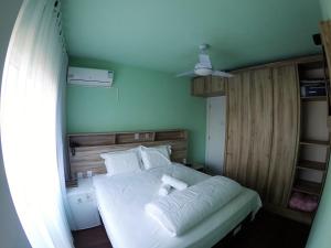 En eller flere senge i et værelse på Hotel Meu Paraíso + 49 billeder