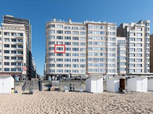 a view of the beach with buildings in the background at Studio in Ostend near Beach and Promenade in Ostend