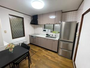 Kuchyň nebo kuchyňský kout v ubytování Slowhouse ZUSHI