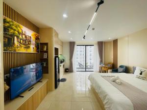 Μια τηλεόραση ή/και κέντρο ψυχαγωγίας στο Vinhomes D'Capitale - studio Apt