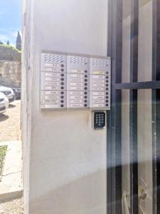 a close up of a door with a remote control at Comfortable Rooms - City Place in Split