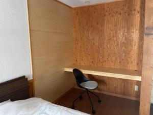 A private inn where you can relax in nature and enjoy with groups of up to 14 people客房内的一张或多张床位