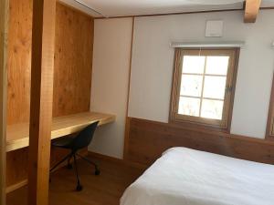 A private inn where you can relax in nature and enjoy with groups of up to 14 people客房内的一张或多张床位