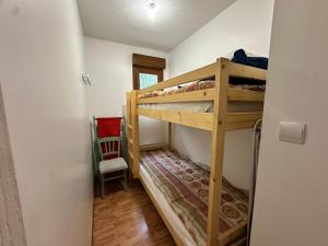 a bedroom with two bunk beds in a room at Villard Village - Appartement 6 pers, 35 m² - FR-1-515-226 in Villard-de-Lans