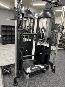 a gym with several treadying machines in a room at お宿あびこシルバーハイツ in Osaka