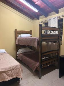 Letto o letti in una camera di Patagonia Hostel