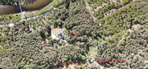 an aerial view of a house in a forest at Cambus O' May Traditional Highland Hotel in Ballater +35 photos