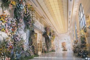a large building with flowers on the walls at Dalat Palace Heritage Hotel in Da Lat