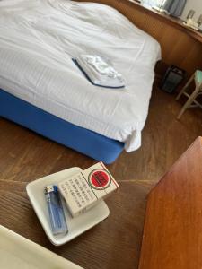 HOTEL POSH客房内的一张或多张床位