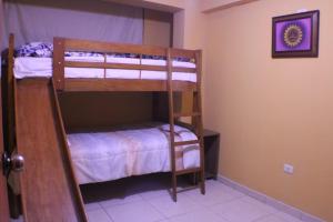 Postel nebo postele na pokoji v ubytování Casa rutz cusco