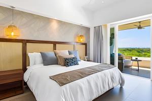 Postel nebo postele na pokoji v ubytování Refugio de ensueño con acceso a la playa + 83 fotografií