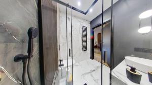 Ένα μπάνιο στο Apartment RCS Rent Czysta 62