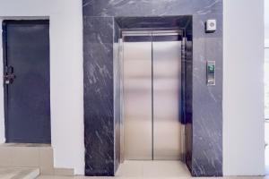 Fotografie z fotogalerie ubytování Super Hotel O Nagamalaipudukottai Madurai v destinaci Madurai
