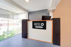 Certifikát, hodnocení, plakát nebo jiný dokument vystavený v ubytování Super Hotel O Nagamalaipudukottai Madurai